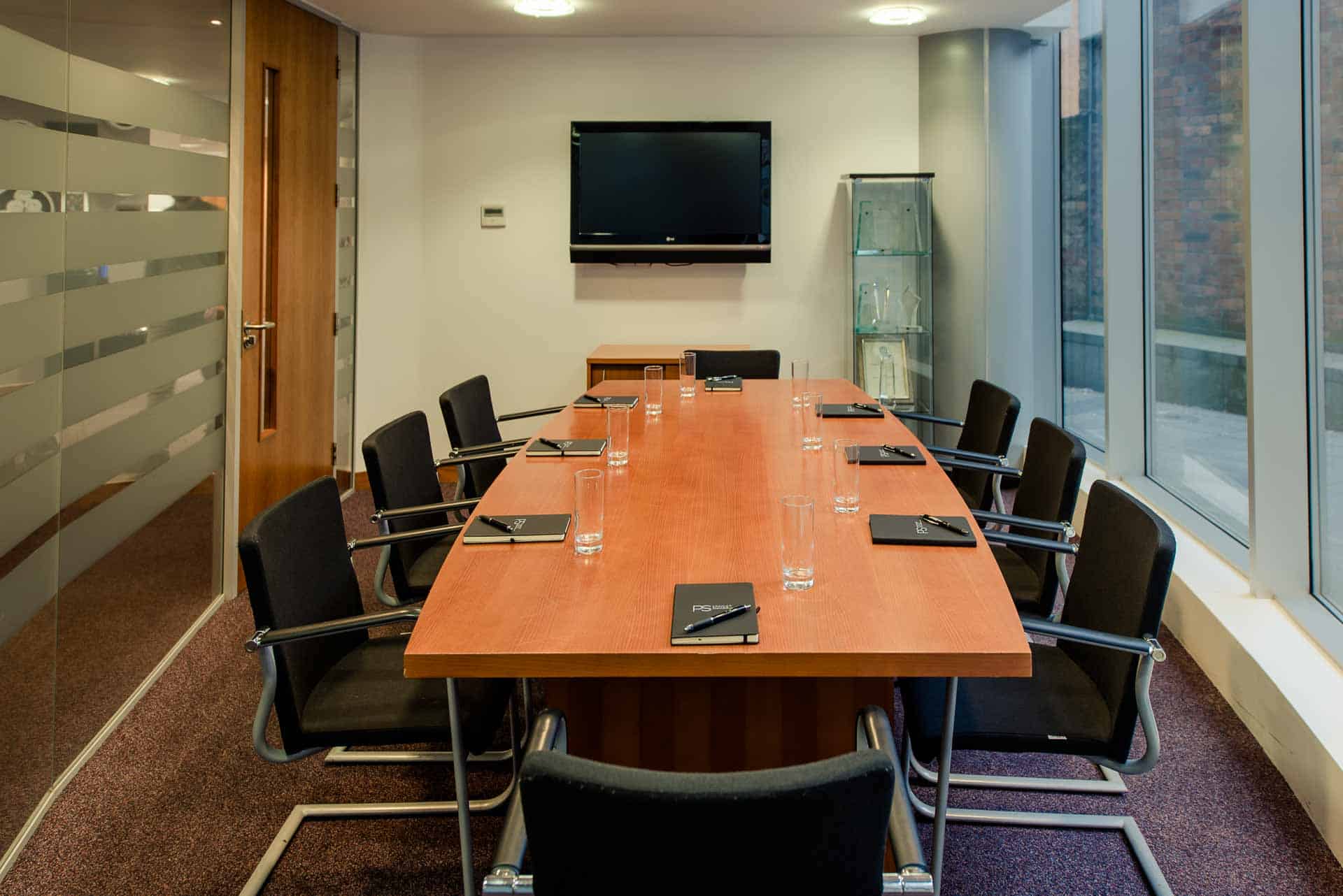 Meeting room with water and TV at PREMIER SUITES Liverpool