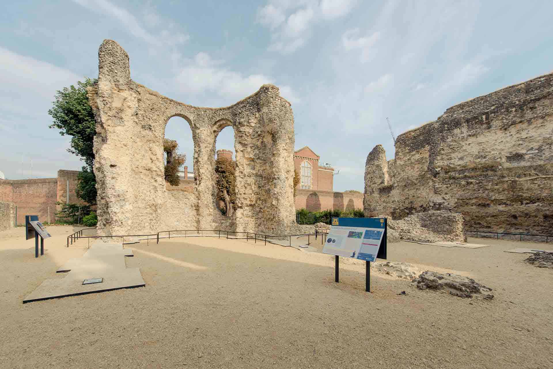 PREMIER SUITES Reading ruins and sign