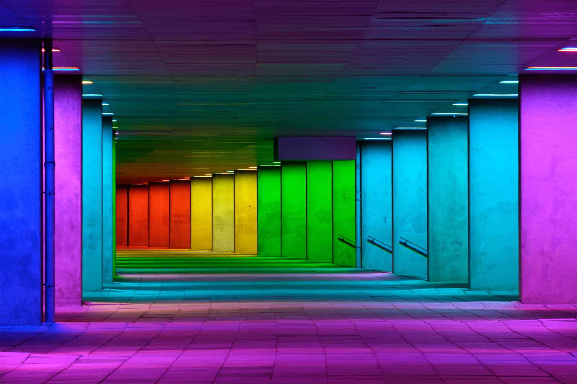 Colorful mulitcolord illuminated gallery tunnel rainbow passage under NAI building, Nederlands Architecture Institute near Museum Park, Rotterdam