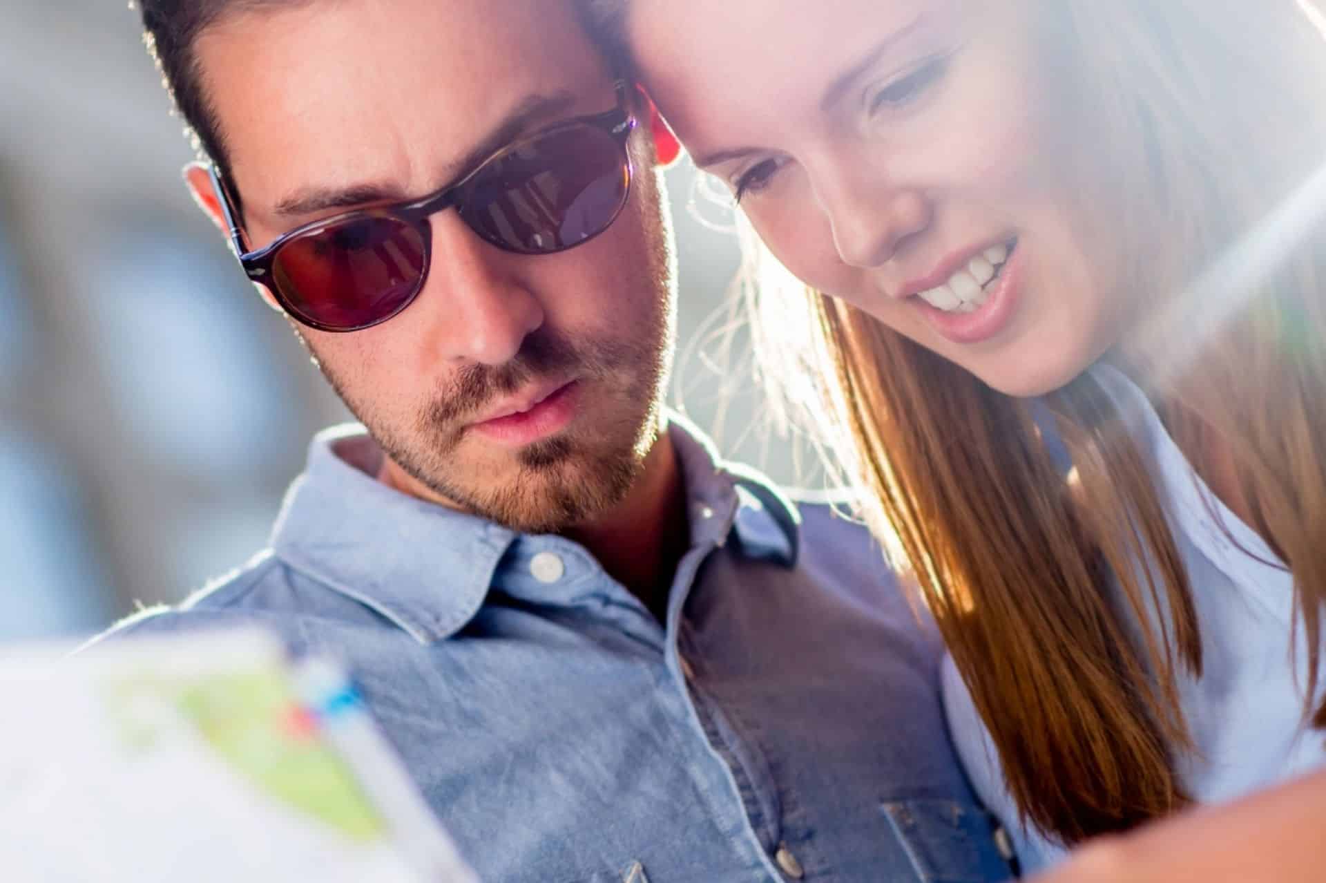 couple reading map