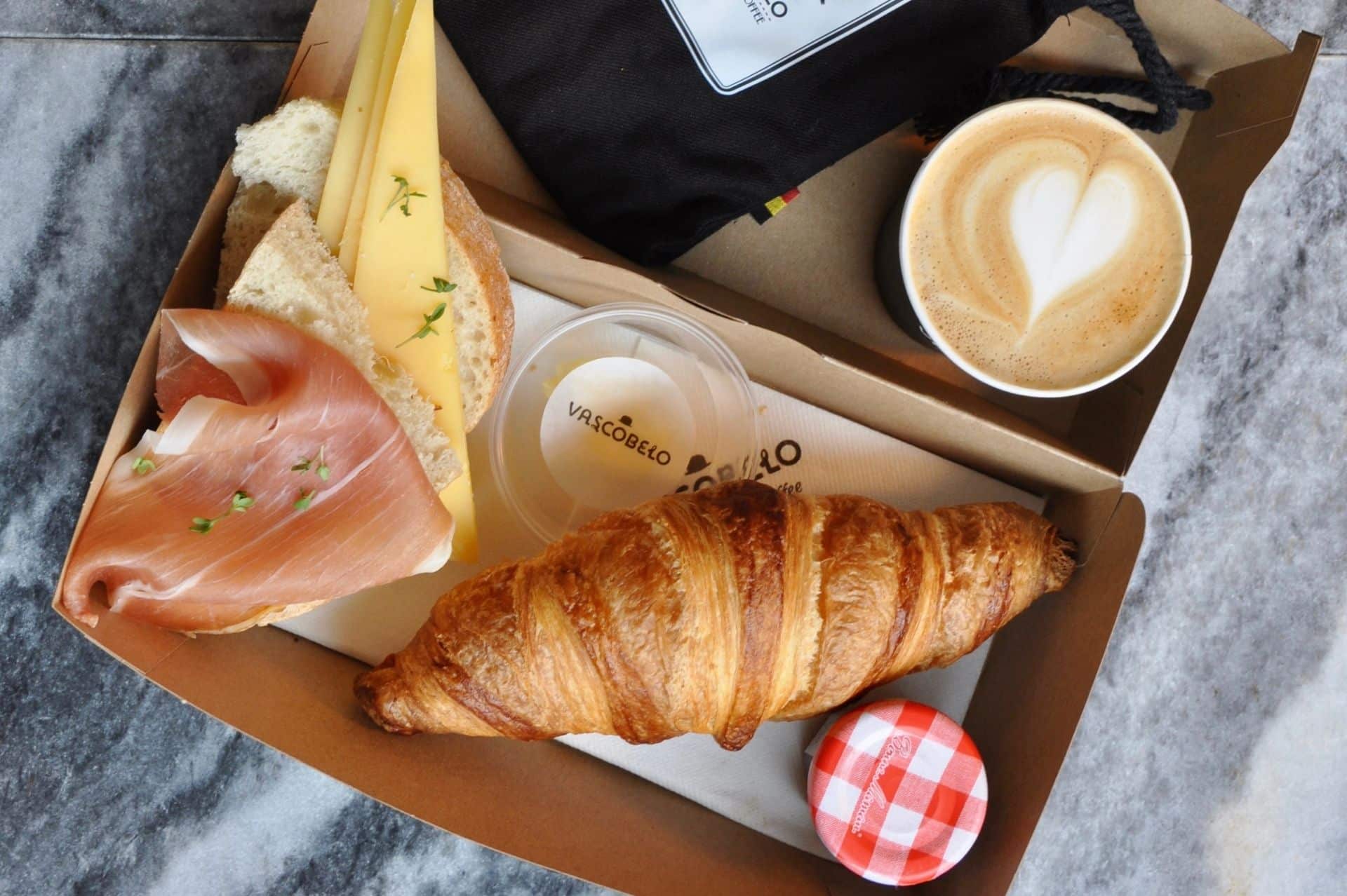 Breakfast box with cheese, meats and pastries