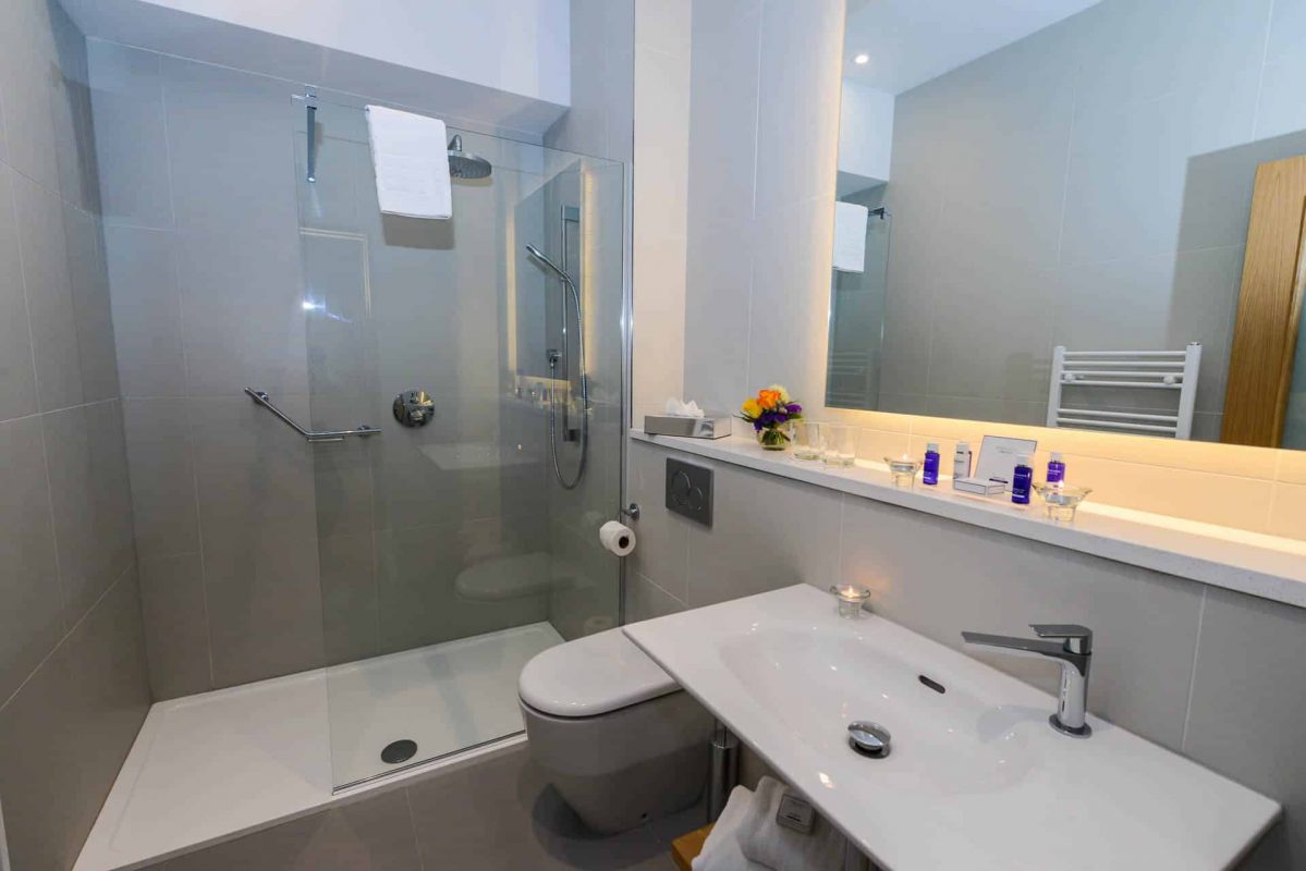 Merrion Suite at PREMIER SUITES PLUS Dublin Ballsbridge en-suite bathroom with walkin shower
